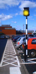 car park with solar powered beacon and white lines