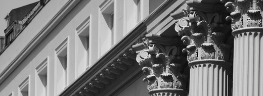 Corinthian columns and architrave.