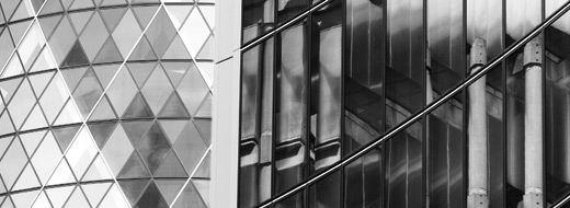 A building near 30 St Mary Axe (the 'Gherkin') in London.