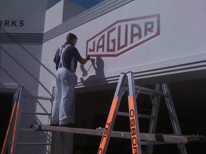 sign painter working